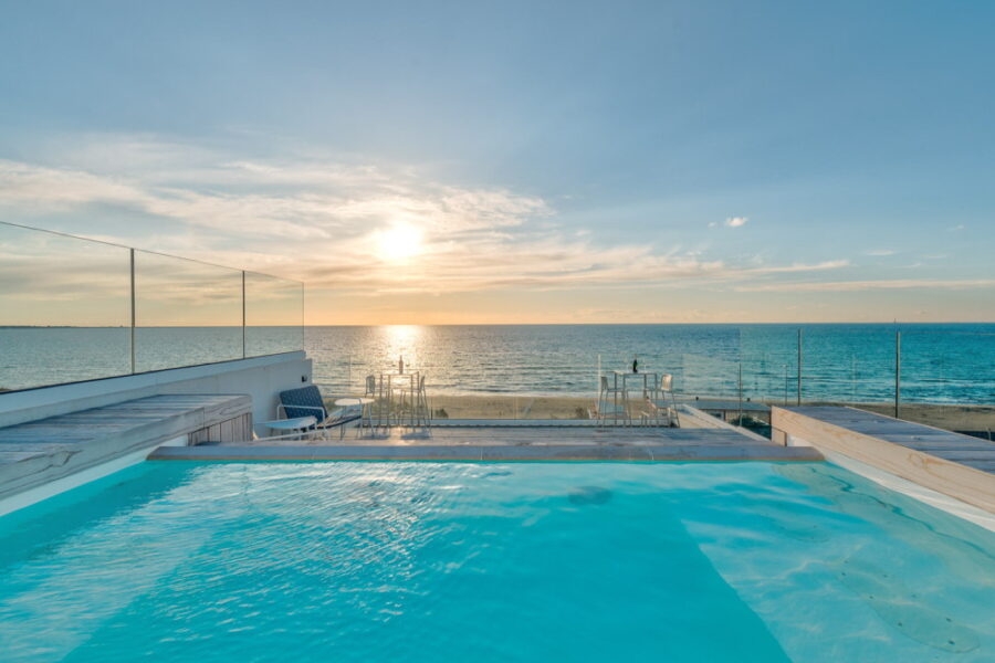 The breathtaking view at the sunset from the pool in the terrace 